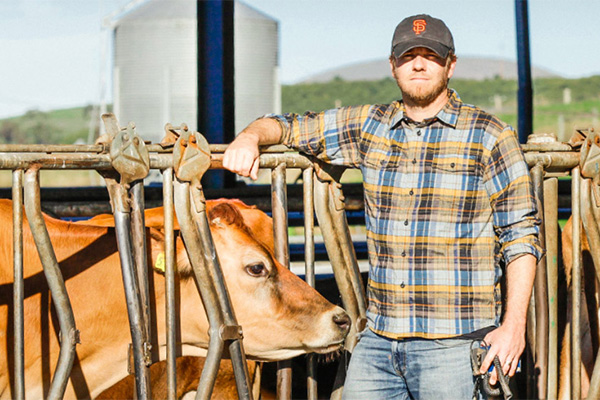 farmer with cow